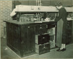 Woman working in a laboratory, The University of Iowa, 1930s