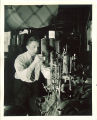 Engineering student working in a technology laboratory, The University of Iowa, 1939