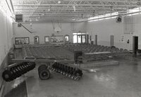 Room with chairs and agricultural equipment