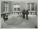 W.E. Galligan, Ralph H. Suebbers and Max Levine  examining clay rings, 1934