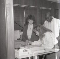 1988  Kathy Baughman, Terry Cosby, and Lisa Neidermayer work on a project for the Des Moines County Soil and Water Conservation District