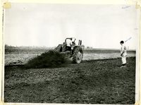 Farmers Using Auger