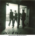 Soldiers in dress uniform walking outside, The University of Iowa, 1950s