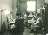 Children reading in University of Iowa Hospitals and Clinics, the University of Iowa, December 1923