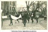 Soldiers marching in Mecca Day parade, The University of Iowa, 1920
