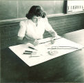 Student using instruments to propagate plants, The University of Iowa, 1940s