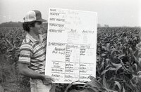 HL Sutton holds a  No-Till sign
