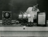Student learning electronic principles in the Agricultural Engineering Laboratory, 1957