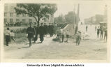 Cadet leading commencement procession west on Washington St., The University of Iowa, June 1913