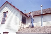 Inspecting the roof.