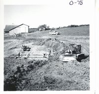Installing pipe spillway on Harvey Michel land, 1968