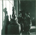 Art students standing near sculpture, The University of Iowa, 1940s
