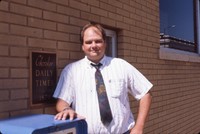 Jeff Lunquist in front of the Cherokee Daily Times.