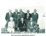 People with University of Iowa Association trophy at reunion, The University of Iowa, 1940s