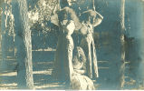 Women on swing, Clear Lake, Iowa, August 9, 1909