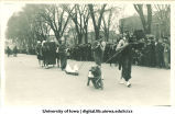 Marchers in costume for Mecca Day parade, The University of Iowa, 1921