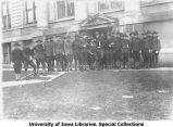 Cadets gathered informally between classes, The University of Iowa, 1918