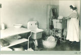 Nurse in the sterilizing room in the isolation hospital, The University of Iowa, November 1920