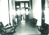 Seats from Zoology Building room 201 displaced for renovations and stacked in 2nd floor hallway, The University of Iowa, 1982