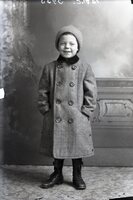 Boy smiling in winter coat