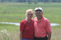 Unidentified couple in pasture land