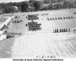 Governor's Day ceremony pass and review on field next to Armory, The University of Iowa, 1931