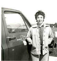 Woman Smiling in Front of SCS Truck