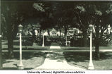 Summer commencement on Pentacrest looking east with Iowa Avenue in background, The University of Iowa, July 1923