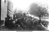 Faculty on Old Capitol steps at graduation ceremony, The University of Iowa, 1900s