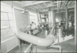 Researcher with large equipment, 1976