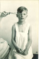 Measuring a child's head, The University of Iowa, 1920s
