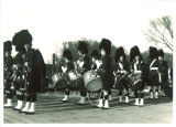 Scottish Highlanders standing in formation, The University of Iowa, 1930s