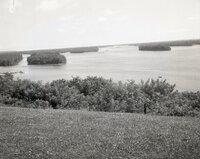 Barges being towed on river