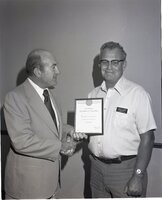 1978  Oren E. Champ receives 25 year service award at a soil conservation meeting in Des Moines