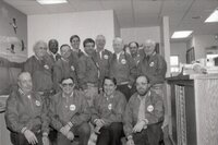 1994 Office staff  wearing matching jackets