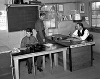 Men with educational advisor, Civilian Conservation Corps Office, Hampton, Iowa, Dec. 4, 1936