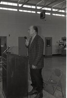 1976  Men at microphone 