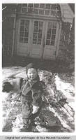 Toddler with dog