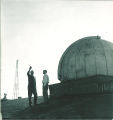 People standing on the roof of the Physics Building next to the astronomy observatory, The University of Iowa, 1950s