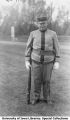 Cadet in uniform with rifle, The University of Iowa, 1914