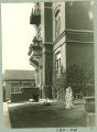 Studying near the south entrance to Calvin Hall, the University of Iowa, 1922