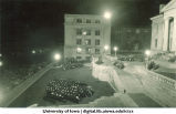 Night commencement ceremony on west portico of Old Capitol, The University of Iowa, June 1928