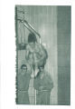 Student performing cannonball dive at swim meet, The University of Iowa, March 1967