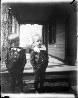 UP450 Two boys by porch