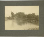 Ames &amp; College Railway engine trying out bridge over Squaw Creek during high water, 1905 or 1906.