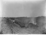 Firing of the kiln, Iowa Ballast and Construction Co., Maxon, Iowa, late 1890s or early 1900s