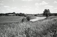 Ranch house  and pond in rural area