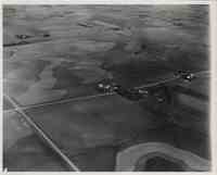 Contoured farmland with farms