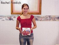 Staff holding doughnuts