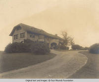 Grey house and carport